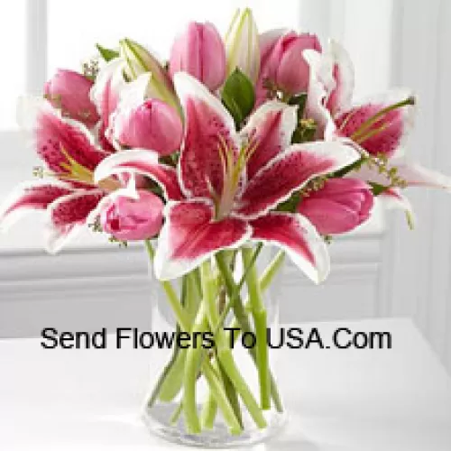 Pink Lilies And Pink Tulips In A Glass Vase