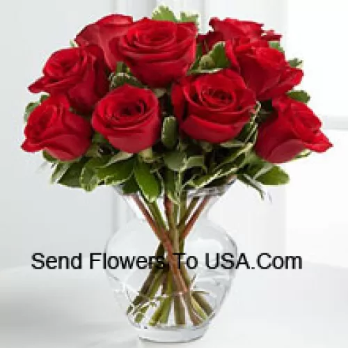 10 Red Roses With Some Ferns In A Vase